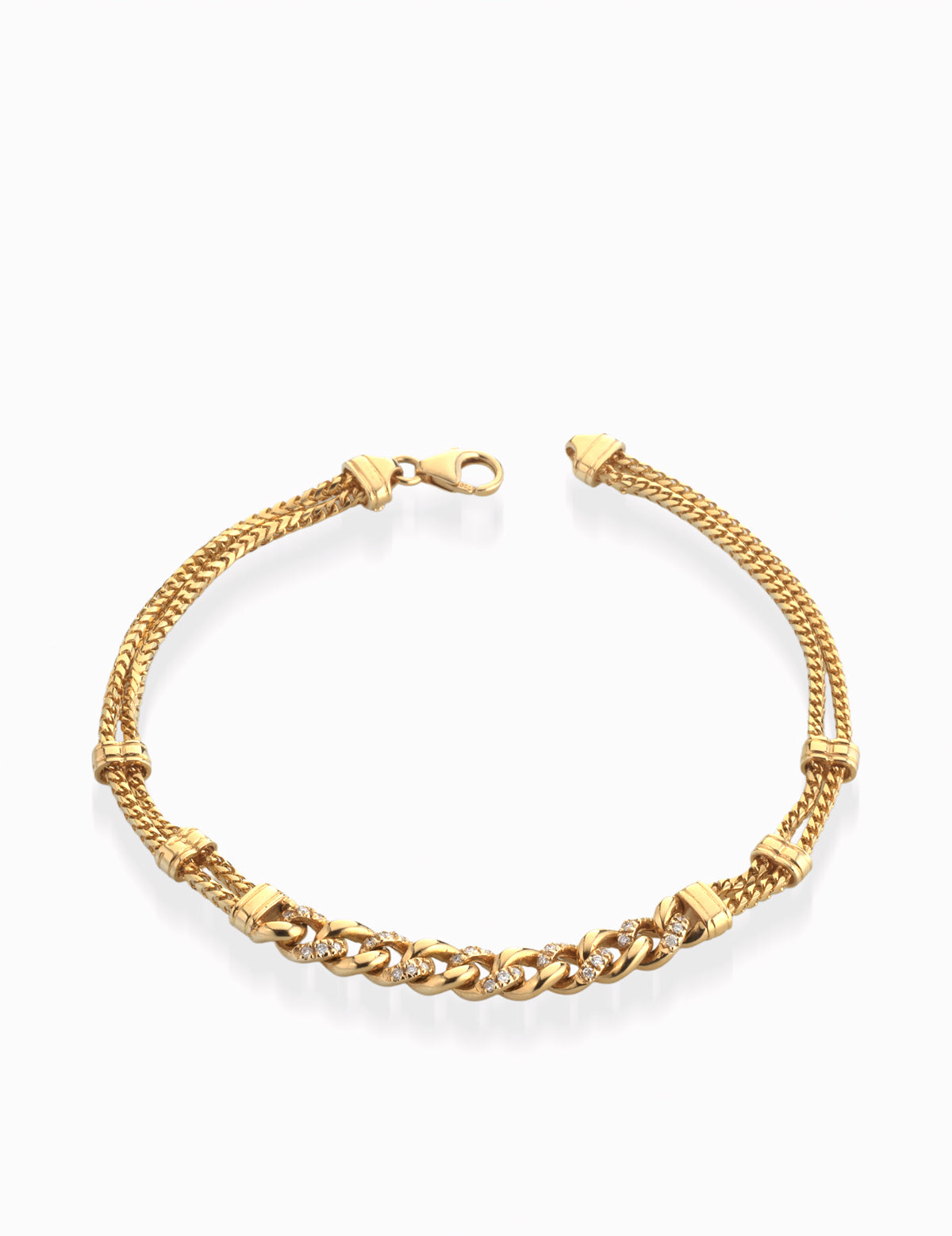 BRACCIALE CON CATENA IN ORO GIALLO E GRUMETTA CON DIAMANTI