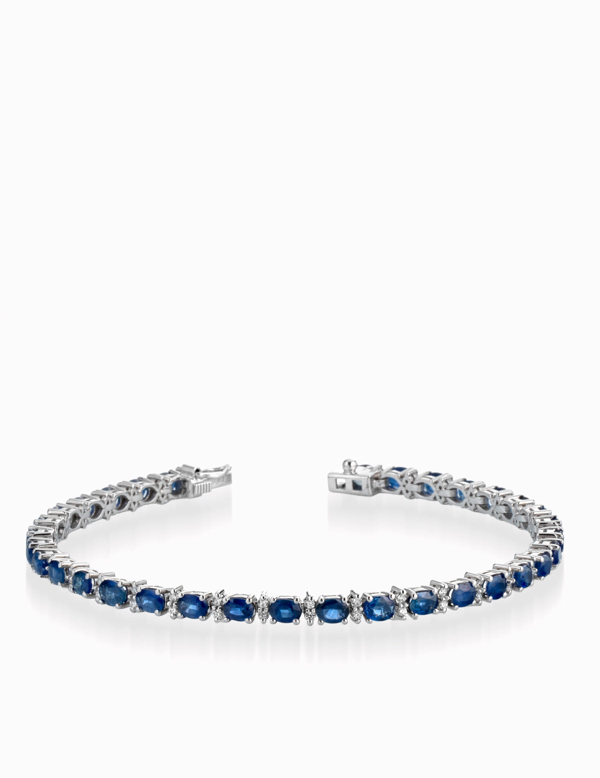 BRACCIALE IN ORO BIANCO CON OVALINI DI ZAFFIRI E ALTERNANZA DI DIAMANTI