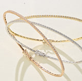 BRACCIALE RIGIDO  IN ORO BIANCO CON DIAMANTI