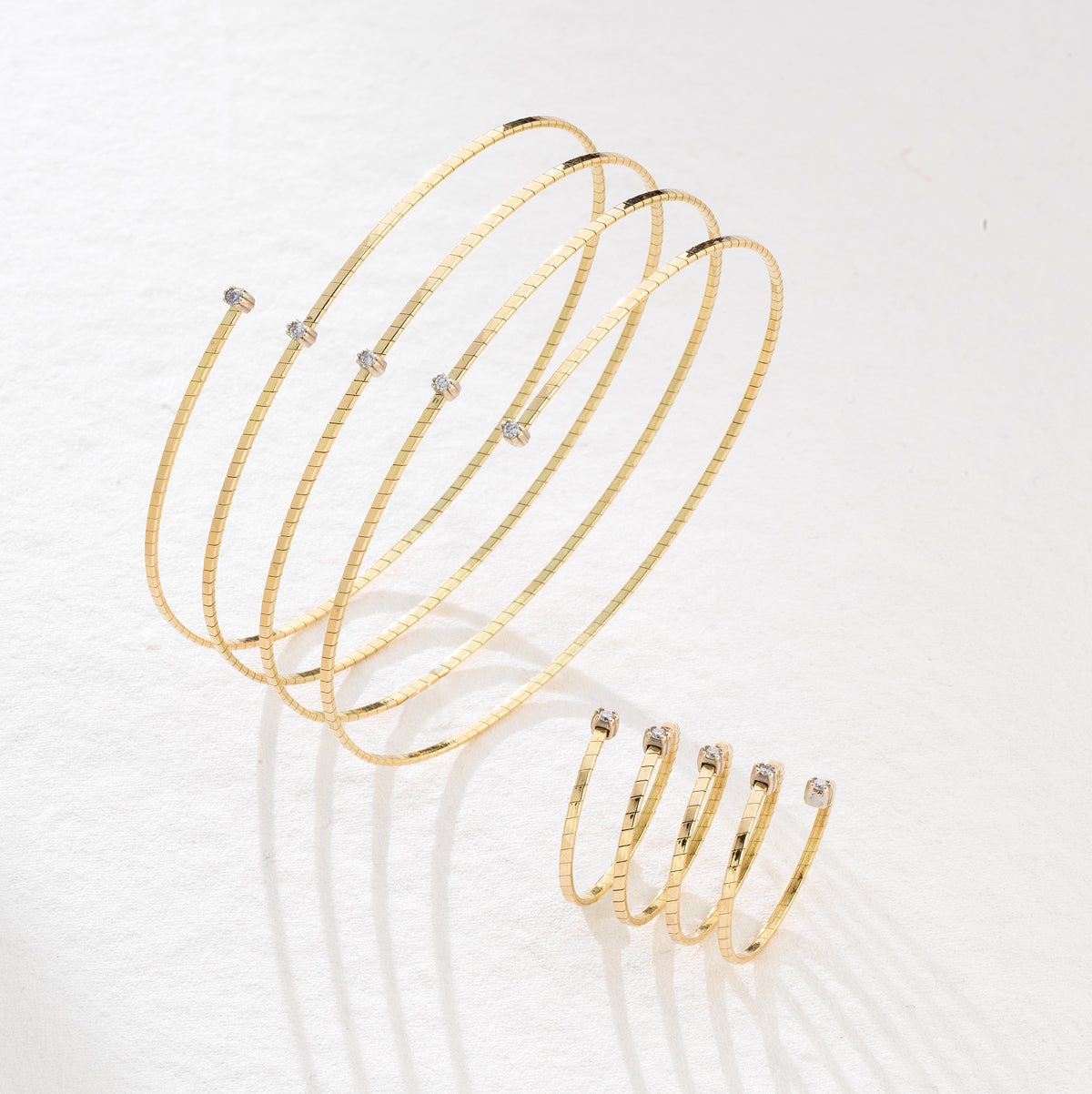 BRACCIALE SNAKE PIU' FILI IN ORO GIALLO CON DIAMANTINI