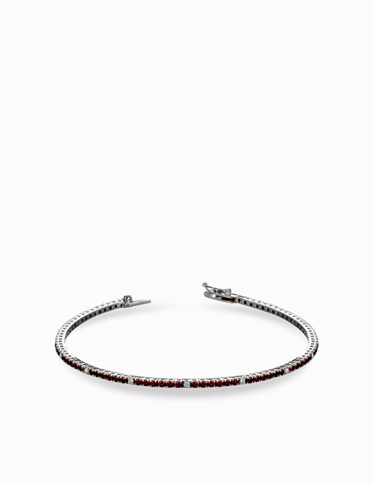 tennis in oro bianco con pietre colorate e diamanti