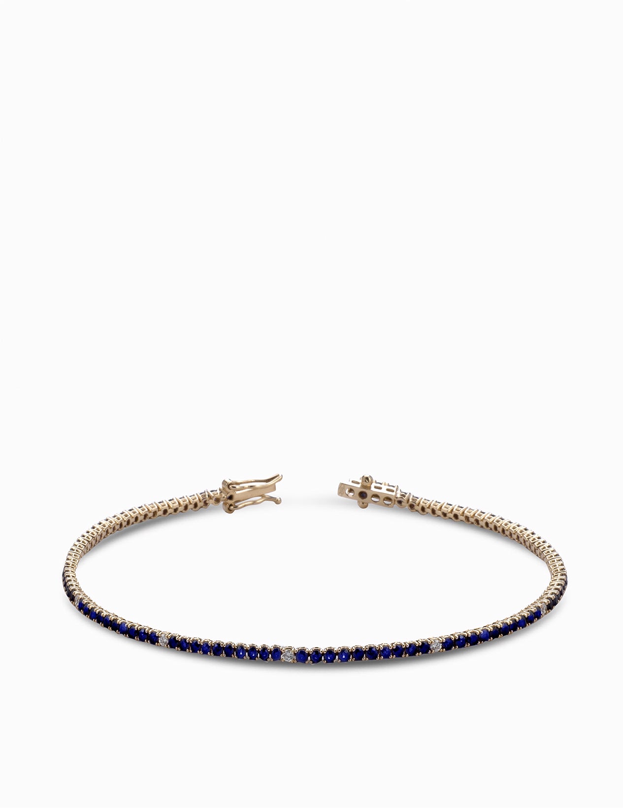 tennis con diamanti bianchi e zaffiri oro giallo