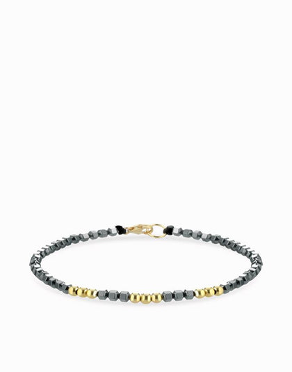 Bracciale a laccio con ematite e sfere in oro giallo Dalù Gioielli 