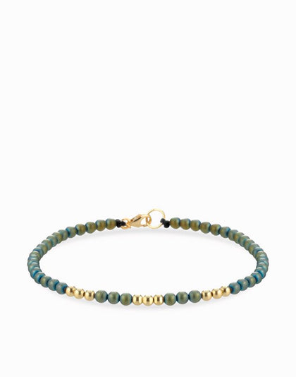 Bracciale a laccio con sfere in ematite nera e oro giallo Dalù Gioielli 
