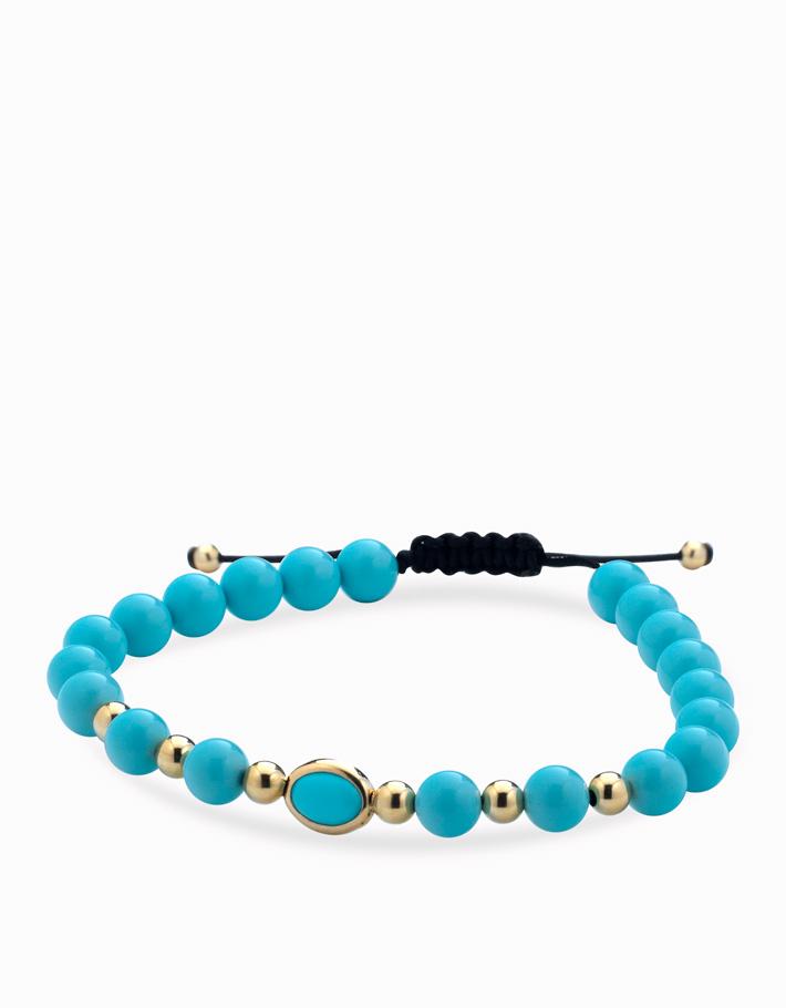 Bracciale con sfere in ceramica azzurra e oro giallo e pietra centrale azzurra Dalù Gioielli 