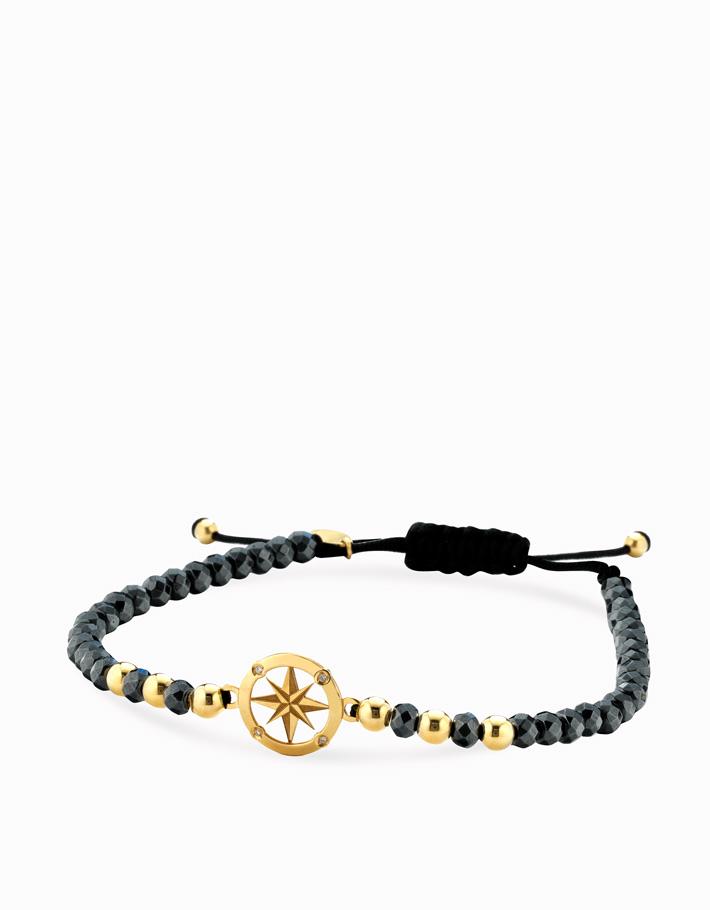 Bracciale in cordino con ematite briolè, sfere e rosa dei venti in oro giallo e diamanti Dalù Gioielli 
