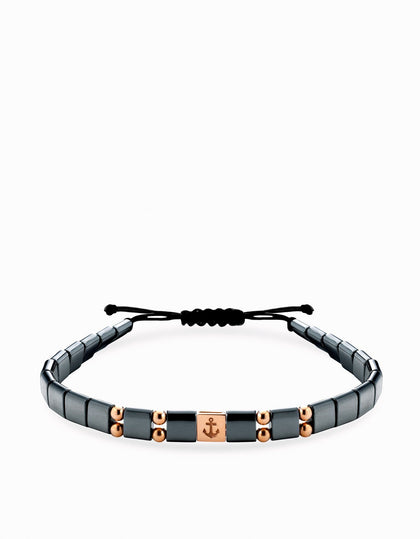 Bracciale in cordino con ematite quadrata ed inserto con ancora in oro giallo Dalù Gioielli 
