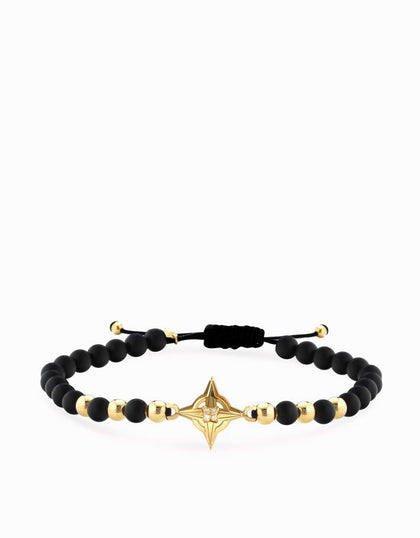 Bracciale in cordino con onice, sfere, rosa dei venti in oro giallo e diamanti Dalù Gioielli 