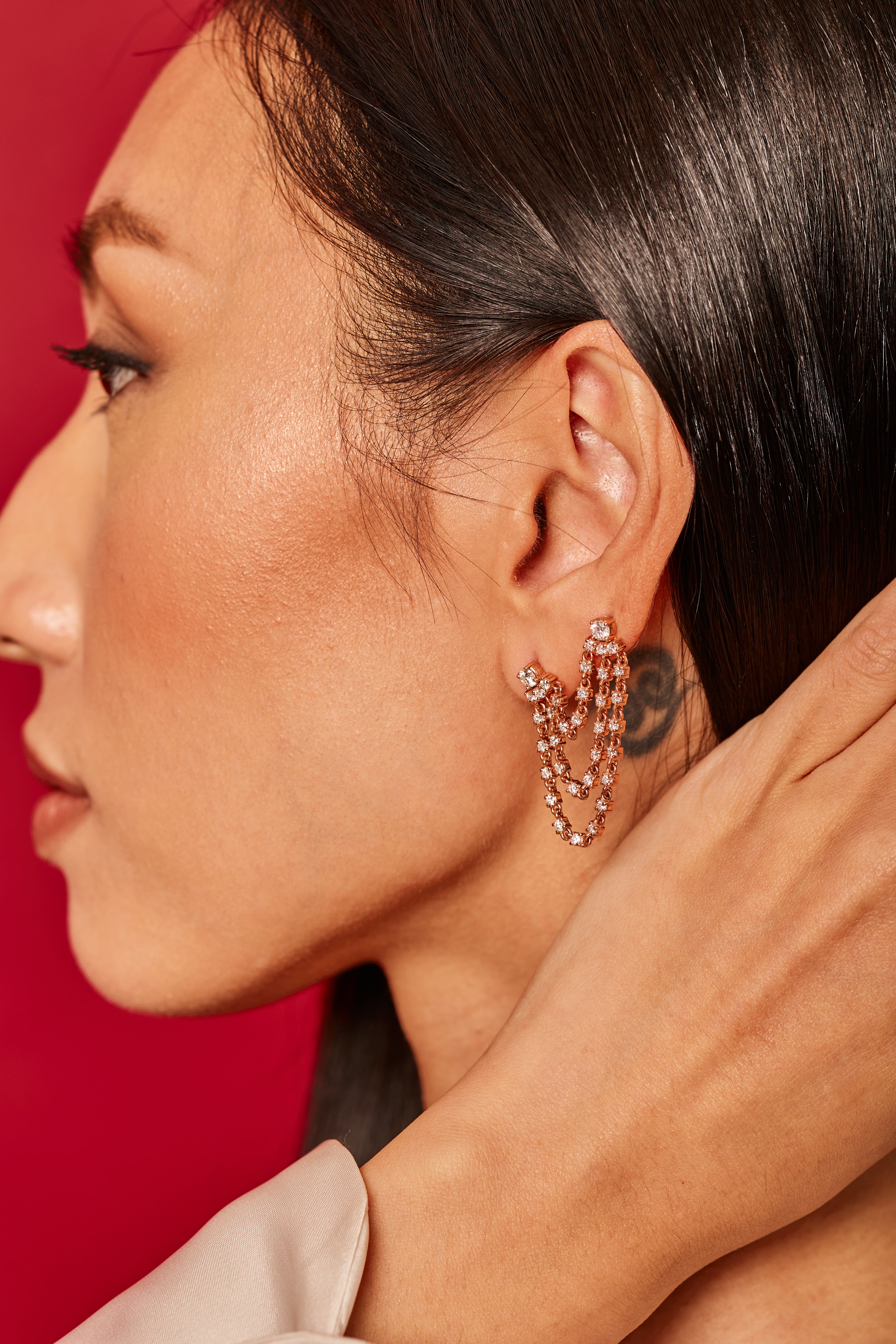 MONO-ORECCHINO DOPPIO FORO CON DIAMANTI