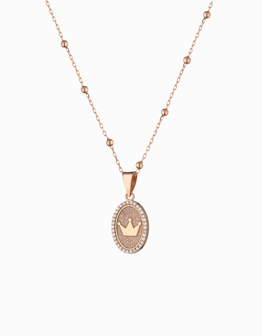 ciondolo in oro rosa con corona centrale  e diamanti