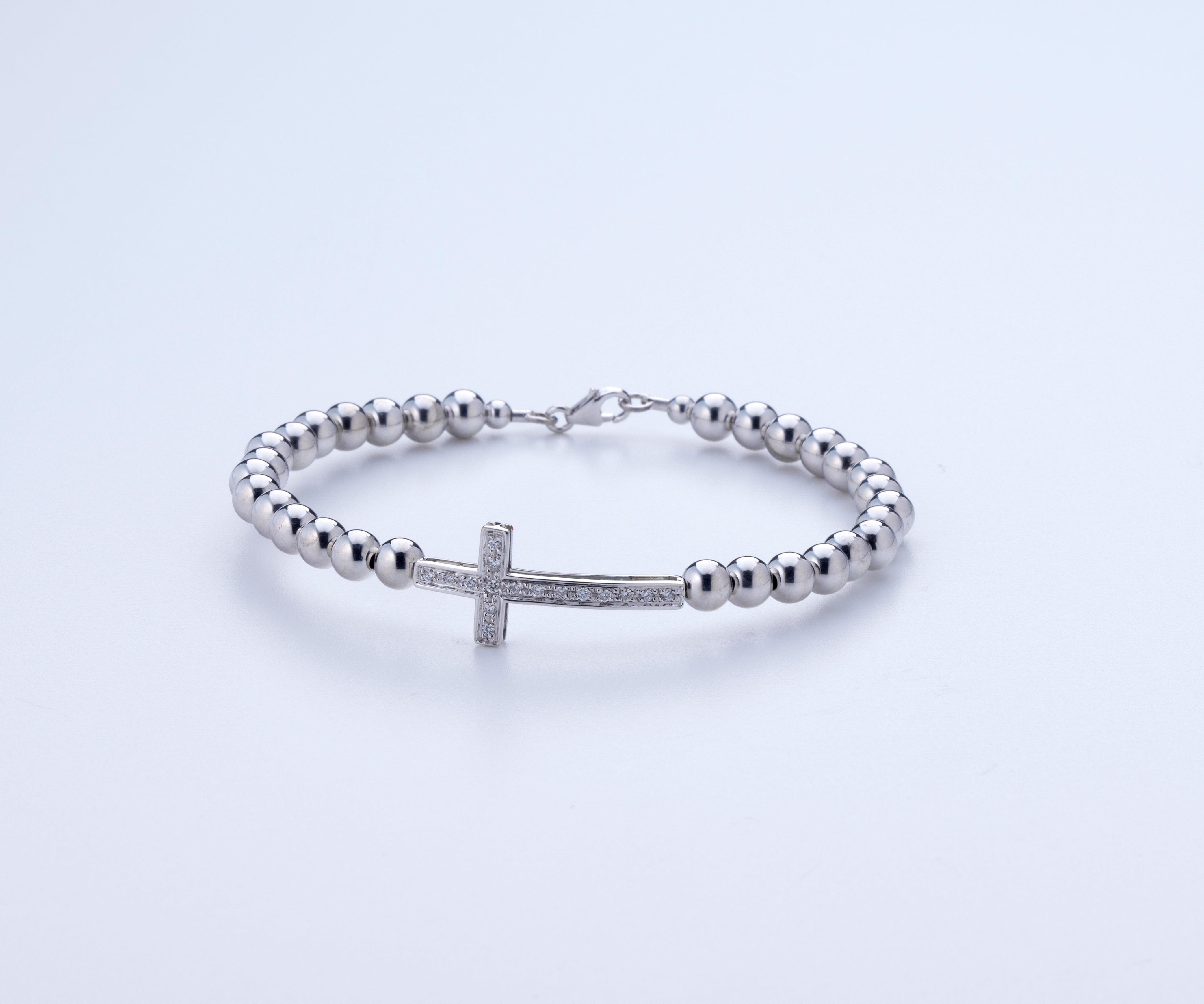Bracciale in oro bianco con croce