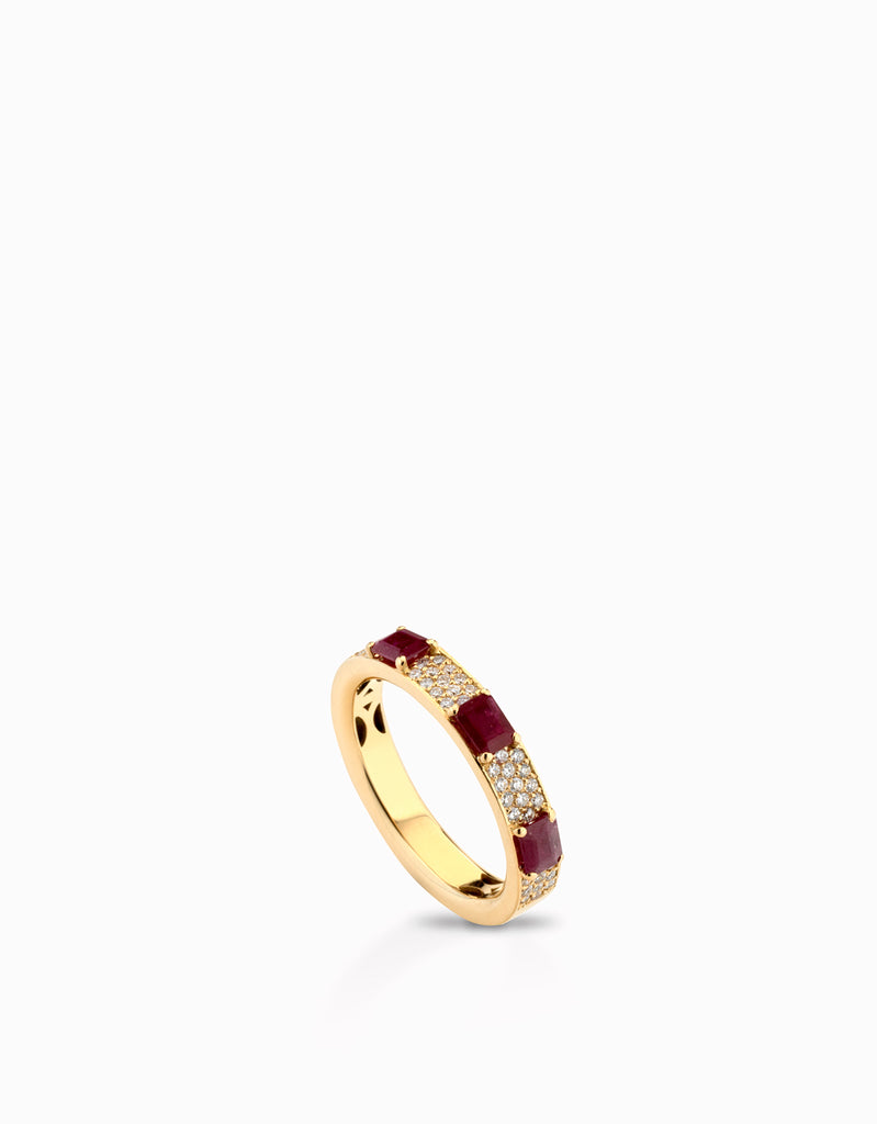 anello fascia diamanti con tre rubini