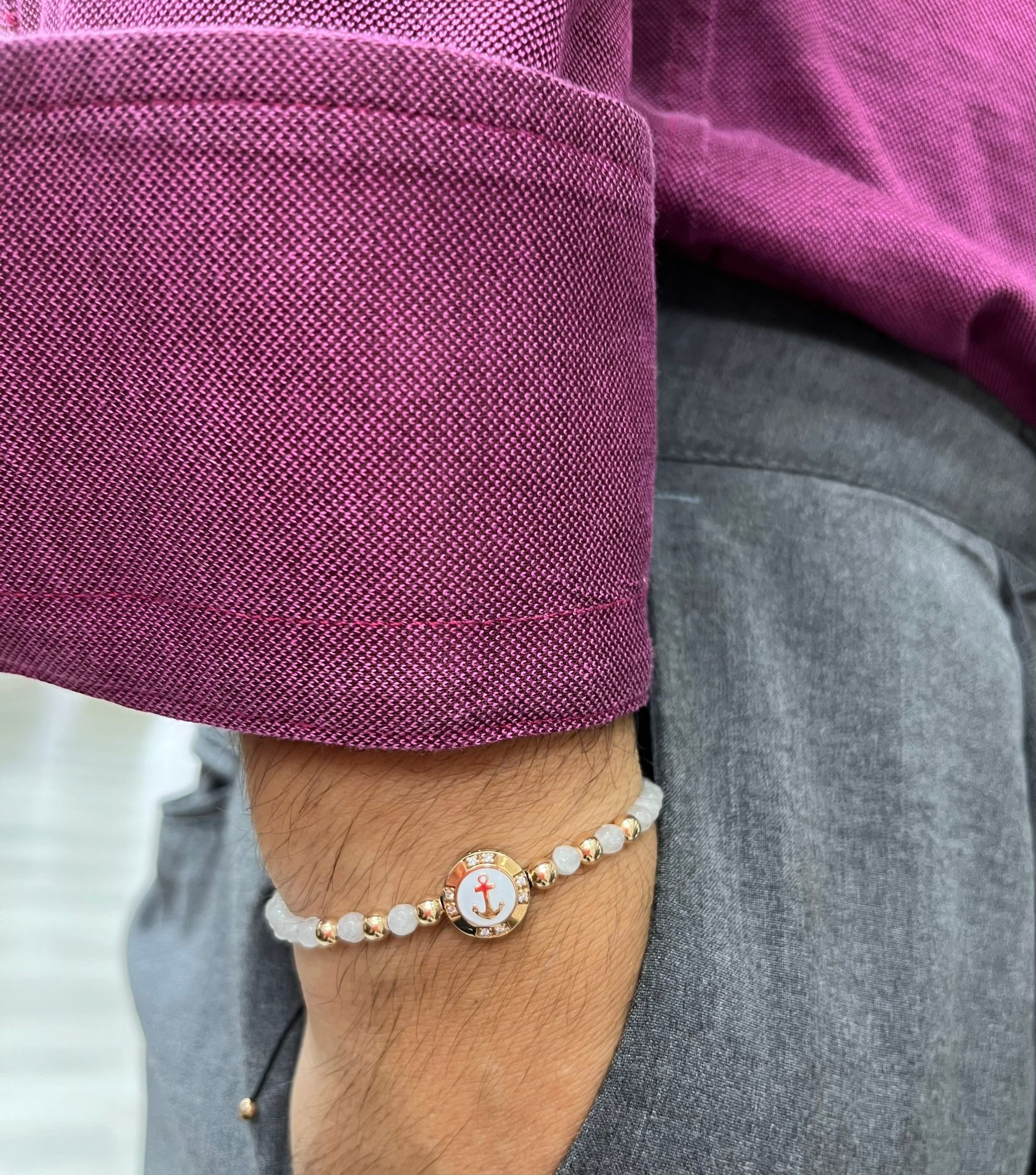 Bracciale a monetina in oro rosa con diamanti  e ancora ed ematite bianca