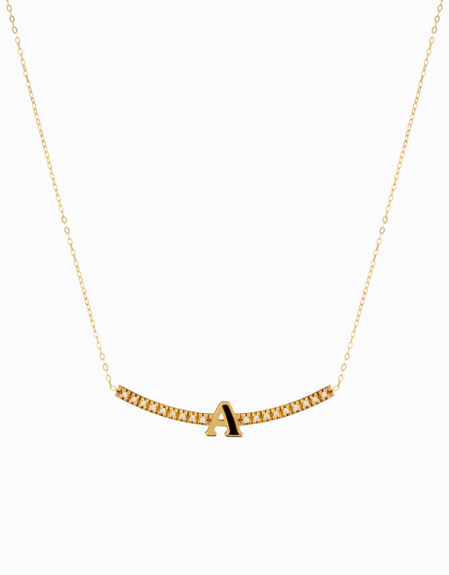 Ciondolo in oro giallo con lettera A smaltata e diamanti